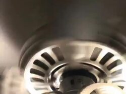 Spinning electric fan on the ceiling; backzoom Stock Footage