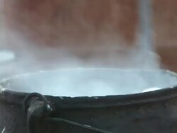Pot being stirred in Himba Tribal Village, Namibia Stock Footage