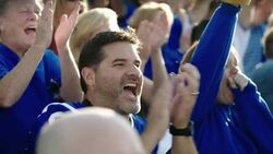 Stadium crowd, excited fan cheers at football game Stock Footage