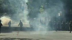 CLEAN : Police demonstrators clash in demo during strike in Caracas News Clip