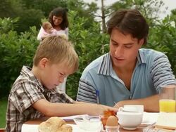 HD DOLLY: Young Family After Breakfast Stock Footage
