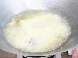 Frying fish. (Thai food) Stock Footage
