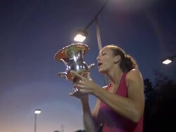 CU, LA, Young female tennis player holding trophy, dusk, Santa Barbara, California, USA Stock Footage