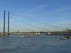 WS View of Dusseldorf city with Rhine river and Oberkassel Bridge / Cologne, North Rhine Westphalia, Germany Stock Footage