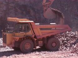 MS Digger and truck in quarry  / Taben-Rodt, North Rhine- Westphalia, Germany Stock Footage