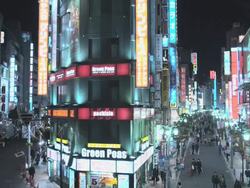 Neon Lit Entertainment Street beside JR Shinjuku South Station, Tokyo, Japan Stock Footage
