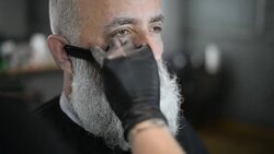 brutal barber clipper mows bearded adult senior hipster Stock Footage