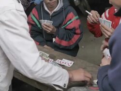 MS group of men playing cards and gambling / Xam Neua, Laos Stock Footage