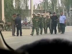 Army soldiers patrol streets of Xinjiang Province News Clip