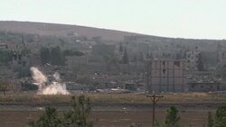 CLEAN : Smoke billows over Kobane as battles continue News Clip
