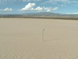 Faucet in a desert landscape Stock Footage