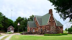 Harrah Oklahoma OK old rock home unique rocks and style Stock Footage
