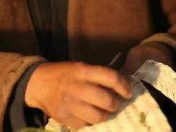 Tunisian Basket Maker weaves basket in traditional way Stock Footage