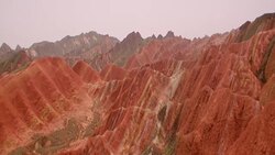 View of rainbow mountains in Zhangye Danxia Landform, China Stock Footage