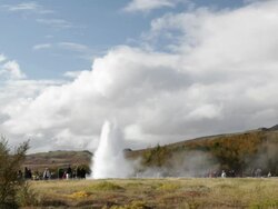 HD Video of visitors watching Iceland geyser erupting at Geysir Stock Footage