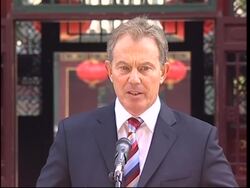 UK PM signs agreements, textile reax, Blair plays football News Clip