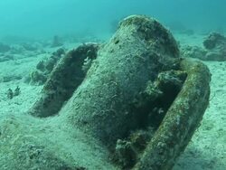 Sand and corrosion cover an artifact at the bottom of the Red Sea. Stock Footage