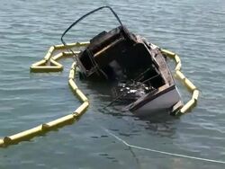 Sinking Boat, Debris Zoom In Stock Footage