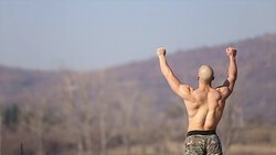 Man with scoliosis feeling like a winner Stock Footage