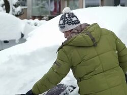 HD: Man Brushing Snow Off The Car Stock Footage