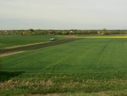 AERIAL Tractor spreading the liquid manure Stock Footage