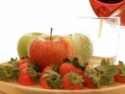 Pouring apples and strawberries Juice Stock Footage