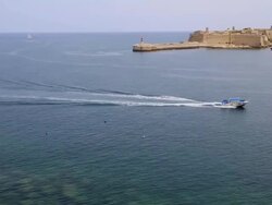Valetta, view of ships entering the harbour in the city Stock Footage