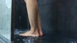 showering woman legs Stock Footage