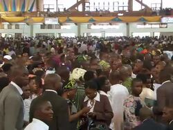 WS ZI View of congregation praying and leaving church / Lagos, Nigeria Stock Footage