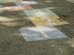 deserted school yard with hopscotch marks Stock Footage