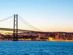 HD Timelapse: Porte 25 de Abril bridge Tagus river Lisbon Stock Footage