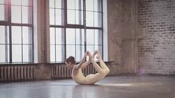 Young Woman Doing Yoga Meditation and Stretching Exercises Stock Footage