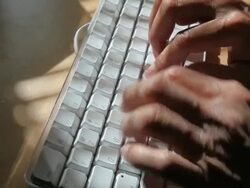 Hands typing on Computer Keyboard Stock Footage