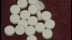 Set Ups of Ecstasy Tablets on a Table News Clip