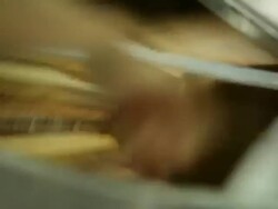 Honey is projected onto the walls of the tank to be filtered Stock Footage