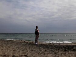 Japanese woman looking at the sea Stock Footage