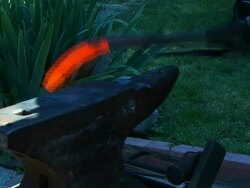 Blacksmith at work with hammer Stock Footage
