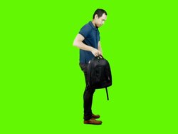 Young asian man casual standing,green background. Stock Footage