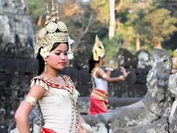 MS Traditional Cambodian apsara dancers dancing in  temples of Angkor Wat / Cambodia Stock Footage