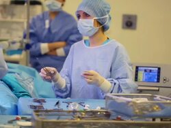 Nurse assisting doctor Stock Footage