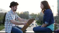 Young painter drawing a portrait Stock Footage