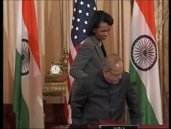 Bush signs law allowing US sale of civilian nuclear materials to India News Clip