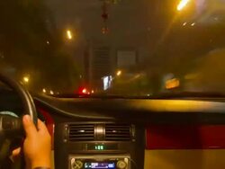 Driving a car at night in city, time lapse Stock Footage