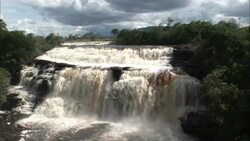 Venezuela's Angel Falls plunges down in a series of cascading water. Stock Footage