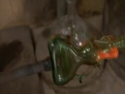 Glass blowing, red hot finished vase is rotated on end of pole, Egypt (sound available) Stock Footage