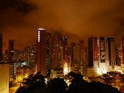 Skyline in Mong Kok, Hong Kong. Night time lapse with dramatic sky. Stock Footage