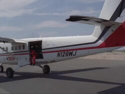 A skydiving plane taxi's out toward the runway. Stock Footage