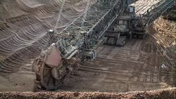 Brown coal mining in surface mine Stock Footage