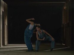 two dancers dancing together in wooden barn Stock Footage