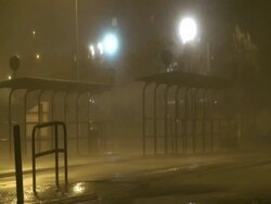 Bus shelters lashed by wind and rain, Typhoon Koppu, Hong Kong on night of 14th sept 2009. With Audio. Stock Footage